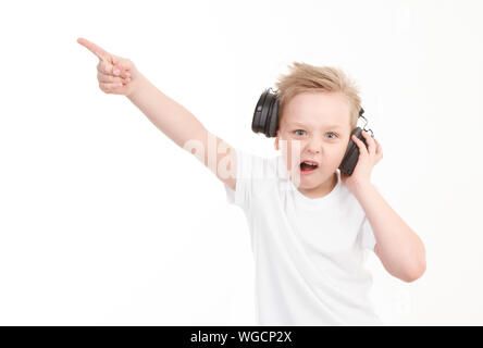 Boy in headphones thinking. Isolated on white Stock Photo