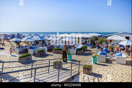 Knokke, Belgium - June 29, 2019: Bar on sandy beach at seaside resort Knokke-Heist along the North Sea coast, West Flanders Stock Photo