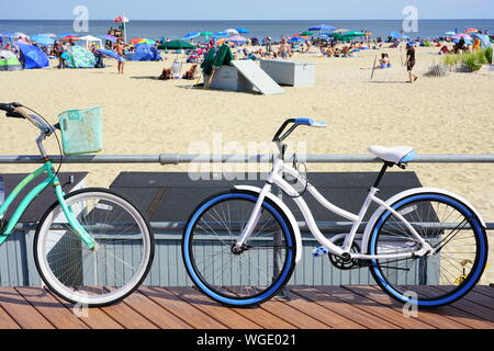 OCEAN GROVE, NJ -10 AUG 2019- View of the boardwalk along the beach in Ocean Grove, a town on the New Jersey Shore, known for its historic Victorian h Stock Photo