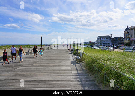 OCEAN GROVE, NJ -10 AUG 2019- View of the boardwalk along the beach in Ocean Grove, a town on the New Jersey Shore, known for its historic Victorian h Stock Photo