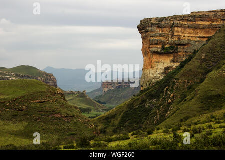 The Brandwag Buttress, a steep Sandstone cliff, standing watch over the entrance of the valley on an overcast day, Photographed in Golden Gate, SA Stock Photo