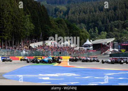 Spa, Belgium. 01st Sep, 2019. First lap, first corner of the Belgian Grand Prix 2019. The tail end of the field tangle. Credit: Will Broadhead/Alamy Live News Stock Photo