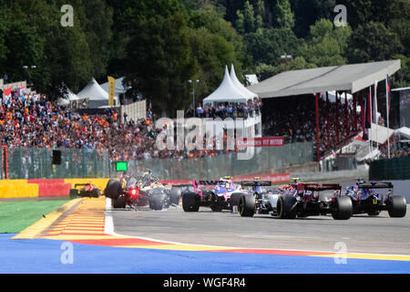 Spa, Belgium. 01st Sep, 2019. First lap, first corner of the Belgian Grand Prix 2019. The tail end of the field tangle. Credit: Will Broadhead/Alamy Live News Stock Photo