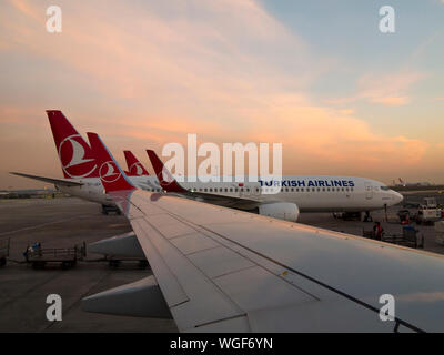 ISTANBUL, TURKEY-MARCH 24, 2017: Turkish Airlines jets sit on the tarmac at Ataturk International Airport in Istanbul, Turkey Stock Photo