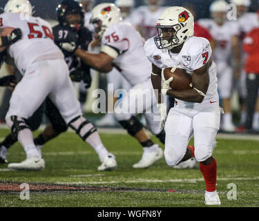 Saturday Aug 31st- Illinois State Redbirds running back Jeffrey Proctor (7) looks for running room during NCAA football game action between the Northern Illinois Huskies vs the Illinois State University Redbirds at Huskie Stadium in DeKalb, IL Stock Photo