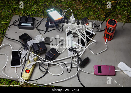 External electric cables power and telephone cables fixed to a brick wall  for the distribution of electricity supply Stock Photo - Alamy
