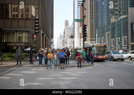 pedestrians waiting to cross crosswalk on michigan avenue north chicago illinois united states of america Stock Photo