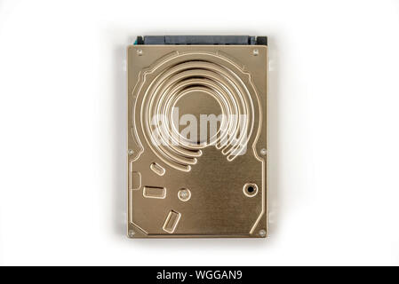 hdd 2.5 hard drive disk on dark background closeup overhead view Stock Photo