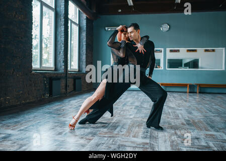 Two dancers in costumes on ballrom dance training Stock Photo