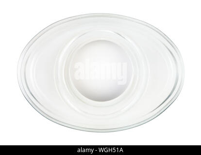 top view of boiled white egg in glass egg cup isolated on white background Stock Photo