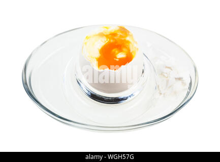 open boiled white egg in glass egg cup isolated on white background Stock Photo