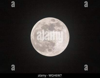 Full moon on black background almost duotone Stock Photo