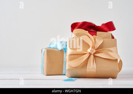 gift boxes in craft paper on white background Stock Photo