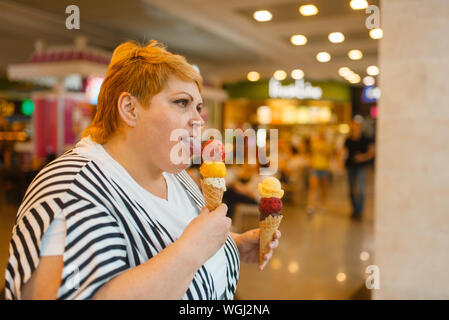 Fat woman eating 2025 icecream