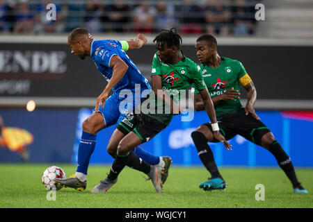 Gent Belgium Septemeber 1 Vadis Odjidja Of Kaa Gent And Corentin Fiore Of Cercle Fight For The Ball During The Jupiler Pro League Match Day 6 Between Kan Gent And Cercle