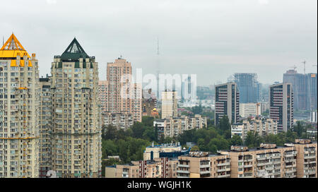 Aerial top view of Kiev city foggy skyline from above with TV tower, Kyiv downtown cityscape, capital of Ukraine. Stock Photo