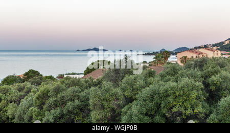 Beautiful evening seascape with island, old tower and lighthouse in Ajaccio, Corsica island, France. Pointe de la Parata on the west coast with ruined Stock Photo