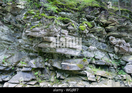 Geological section of igneous rocks close-up. Stock Photo