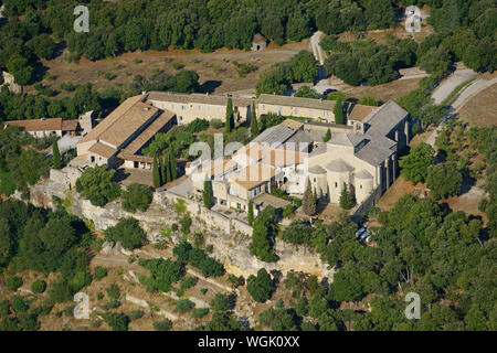 AERIAL VIEW. Benedictine Abbey of Notre-Dame de Ganagobie on a wooded hilltop. Ganagobie, Durance Valley, Alpes de Haute-Provence, France. Stock Photo