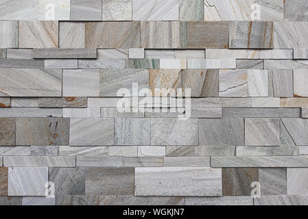 Split modern artificial grey and brown marble wall texture Stock Photo