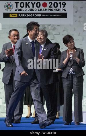 Tokyo, Japan. 1st Sep, 2019. Japanese Prime Minister Shinzo Abe (C) attends the award ceremony for the mixed team competitions at the World Judo Championships Tokyo 2019 in the Nippon Budokan. Abe, Tokyo Governor Yuriko Koike and Tokyo 2020 Olympic President Yoshiro Mori attended the final day of competitions and congratulated the winners during the award ceremony. Credit: Rodrigo Reyes Marin/ZUMA Wire/Alamy Live News Stock Photo