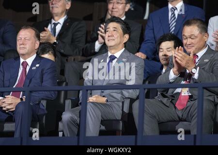 Tokyo, Japan. 1st Sep, 2019. Japanese Prime Minister Shinzo Abe (C) attends the mixed team competitions at the World Judo Championships Tokyo 2019 in the Nippon Budokan. Abe, Tokyo Governor Yuriko Koike and Tokyo 2020 Olympic President Yoshiro Mori attended the final day of competitions and congratulated the winners during the award ceremony. Credit: Rodrigo Reyes Marin/ZUMA Wire/Alamy Live News Stock Photo