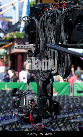 Professional video camera on automated motorized arm. Stock Photo