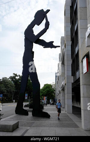 Hammering man, a giant sculpture by the American artist Jonathan Borofsky. Basel, Switzerland Stock Photo