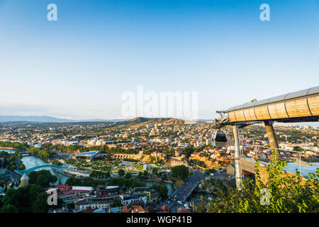 Tbilisi, Georgia - August 2019. Tbilisi downtown and old town aerial from Tbilisi funicular in the capital of Georgia at sunset. Stock Photo