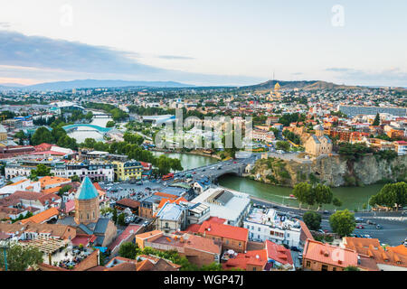 Tbilisi, Georgia - August 2019. Tbilisi downtown and old town aerial from Tbilisi funicular in the capital of Georgia at sunset. Stock Photo