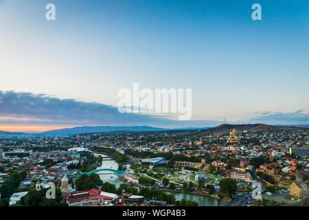 Tbilisi, Georgia - August 2019. Tbilisi downtown and old town aerial from Tbilisi funicular in the capital of Georgia at sunset. Stock Photo