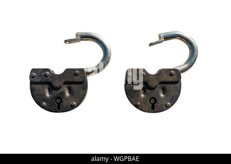 Two open padlocks lying next to each other, isolated on a white background with a clipping path. Stock Photo