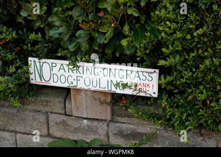 No Parking, No Dog Fouling On Grass Stock Photo