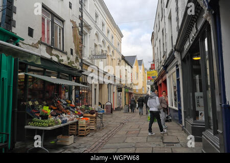 Shops in Church street in Monmouth Wales UK, Welsh town centre Narrow pedestrian street Stock Photo