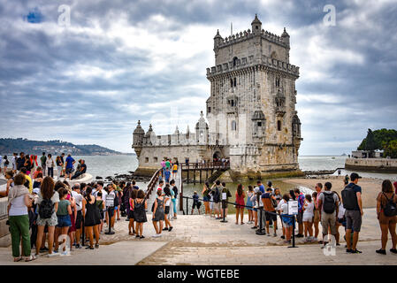 Lisbon, Portugal - July 26, 2019: Crowds of tourists at the entrance to Belem Tower Stock Photo