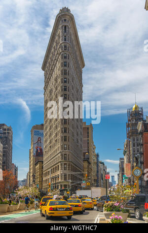 NEW YORK CITY - APRIL 15: Flatiron Building April 15, 2013 in New York, NY. Finished in 1902, the landmark skyscraper was designated a City Landmark i Stock Photo