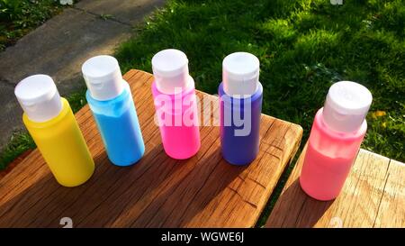 Download High Angle View Of Colorful Bottles By Syringe Stock Photo Alamy Yellowimages Mockups