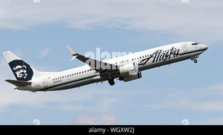 Richmond, British Columbia, Canada. 31st Aug, 2019. An Alaska Airlines Boeing 737-900 (N319AS) single-aisle jet airliner airborne after take-off. Alaska Airlines is part of the Alaska Air Group Inc., an airline holding company. Credit: Bayne Stanley/ZUMA Wire/Alamy Live News Stock Photo