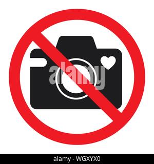No cameras allowed sign. Flat icon in red crossed out circle. Isolated vector illustration on white background. Stock Vector