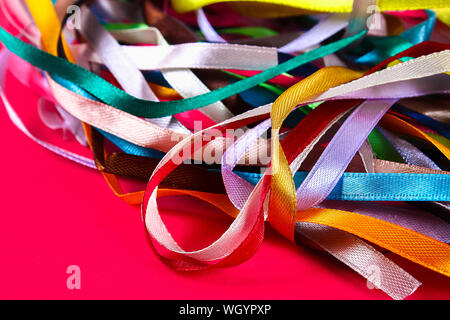 multi-colored ribbons for sewing, needlework from fabric Stock Photo