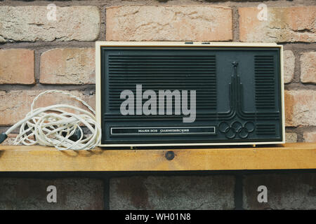 ST. PETERSBURG, RUSSIA - AUGUST 7, 2019: old Soviet radio receiver launched on the occasion of the 1980 Summer Olympics. Vintage processed Stock Photo