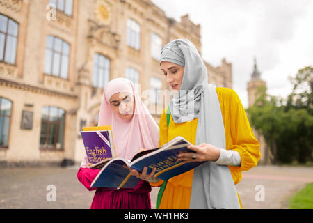 International muslim students feeling worried before exam Stock Photo