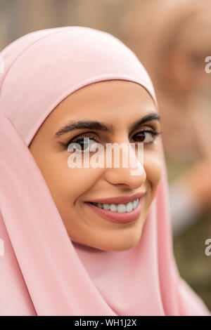 Beautiful young muslim woman wearing pink hjab Stock Photo