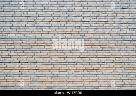 yellow colored brick wall for background use Stock Photo