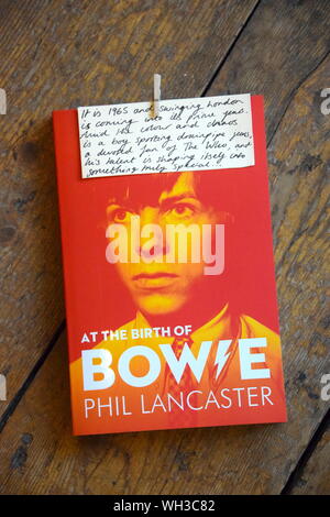 Phil Lancaster's book on life with Bowie in the band The Lower Third. Annotation by bookshop sales assistant. Stock Photo