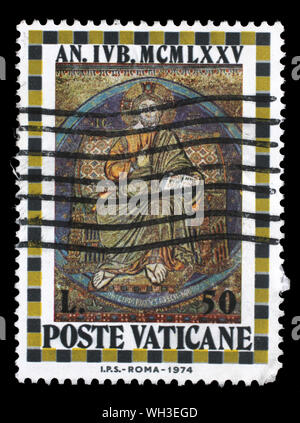 Stamp issued in Vatican shows Christ Enthroned, the Holy Year, circa 1974. Stock Photo