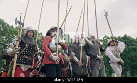 Warriors with fighting with spears in a battle. Warriors in attack. Stock Photo