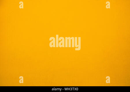yellow wall surface texture for background Stock Photo