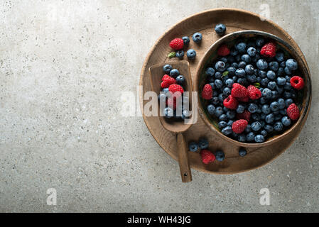 Berries overhead closeup colorful assorted mix of blueberry and raspberry Stock Photo