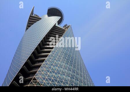 NAGOYA, JAPAN - APRIL 29, 2012: Mode Gakuen Spiral Towers building in Nagoya, Japan. The building was finished in 2008, is 170m tall and is among most Stock Photo